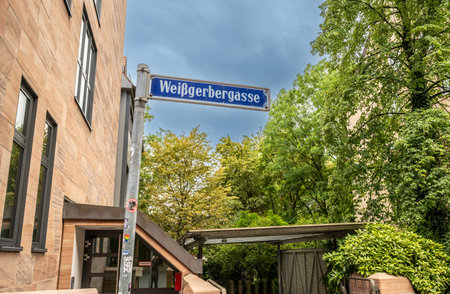 Nuremberg, Germany, August 1, 2023. The sign of the Tanners' Street, a tourist attraction for the beauty of the ancient houses that housed the dyers' workshops. Travel destinations.の写真素材