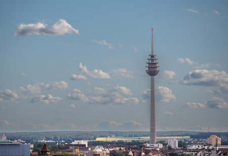 uremberg, Germany, August 3, 2023. Cityscape from the hill, on the outskirts stands out the large antenna for radio and television.の写真素材