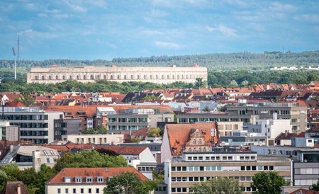 Nuremberg, Germany, August 3, 2023. Cityscape from the hill, on the outskirts stands the congress center: a gigantic unfinished work from the Second World War of the Nazi regime.の写真素材