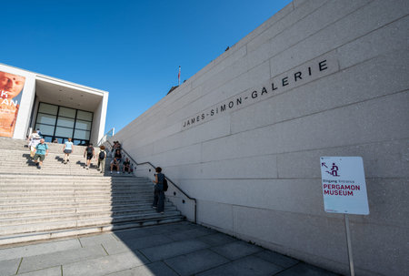 Berlin, germany, august 15, 2023. Tourists exploring the modern james simon galerie entrance building, leading to the pergamon museum on museum island in berlinのeditorial素材