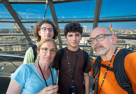 Berlin, germany, august 15, 2023. Family exploring the reichstag glass dome in berlin, enjoying city...