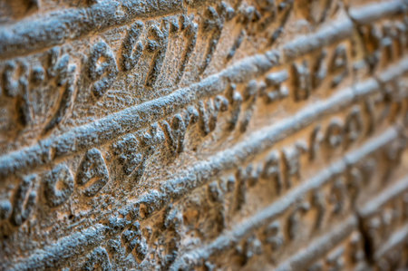 Berlin, germany, august 16, 2023. Ancient stone carving revealing detailed historical text and...