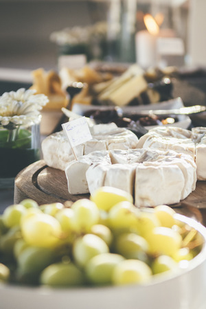 Camembert on wooden plateの写真素材
