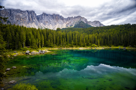 Lake Carezza is a small alpine lake located in the upper Val d'Ega at 1.534. It is set in the water...