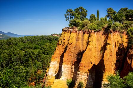 Roussillon. The Ocher Path the Sentier Les Ocres through the Red Cliffs of Roussillon Les Ocres, a...