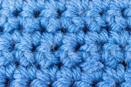 Handmade blue knitting wool texture backgroundの写真素材