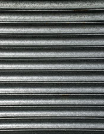 close-up of al corrugated steel roller shutterの写真素材