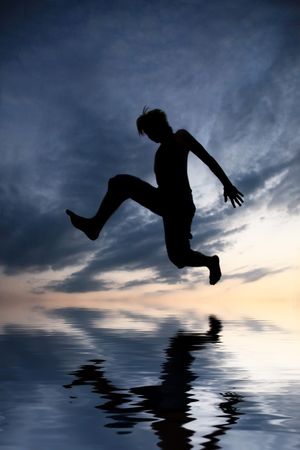 acrobatic at beachの写真素材