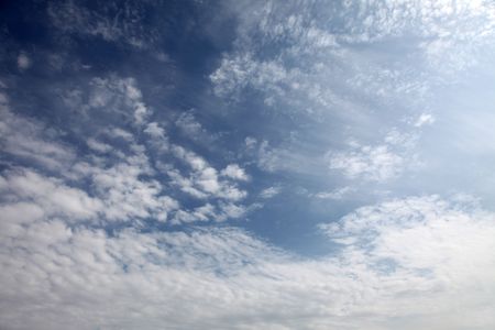 blue sky with clouds background の写真素材