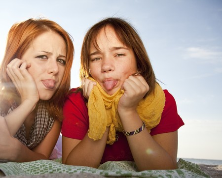 Two beautiful girls in close-up viewの写真素材