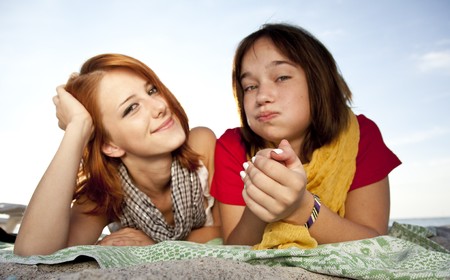 Two beautiful girls in close-up viewの写真素材