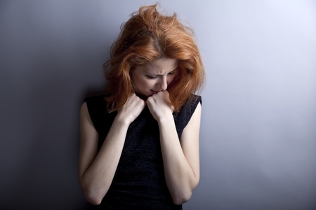 Portrait of sad girl in 80s style.の写真素材