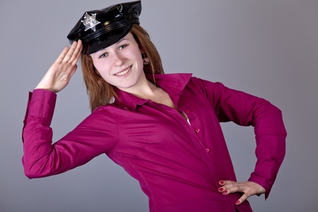 Girl in cap. Studio shot.の写真素材