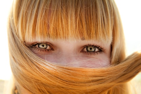 Close-up view at girl's eyes.の写真素材