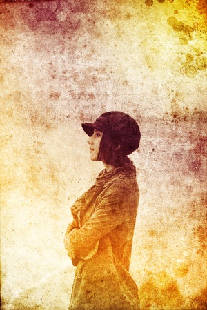 Portrait beautiful girl with scarf. Photo in old multicolor style.の写真素材