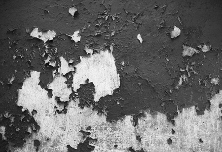 Cracked wall and paint. Photo in black style.の写真素材