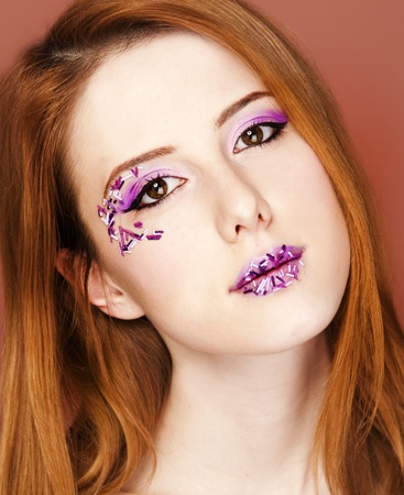 Portrait of beautiful redhead girl with style make-up.の写真素材