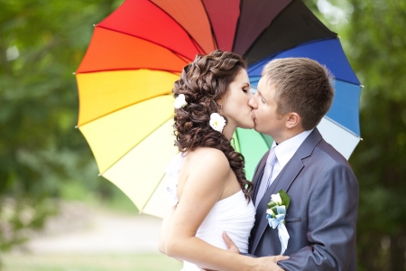 Young couple groom and bride kissing.の写真素材