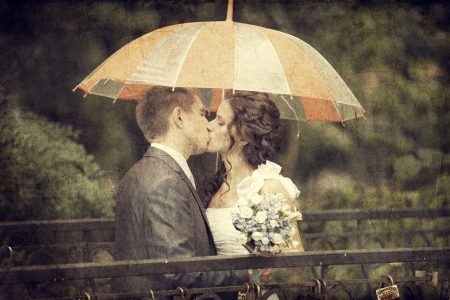 Young couple groom and bride kissing.の写真素材