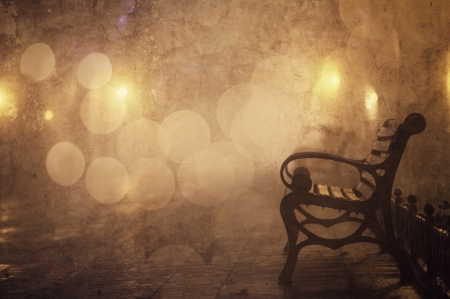 Bench in night alley with lights in Odessa, Ukraine.の写真素材