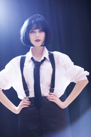 Fashion women with tie. Studio shot with backlight.の写真素材