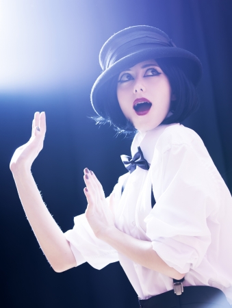 Fashion women with bow tie. Studio shot with backlight. の写真素材