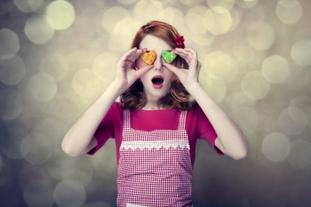 Redhead women with cookiesの写真素材