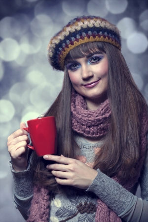 Style girl in scarf with cupの写真素材