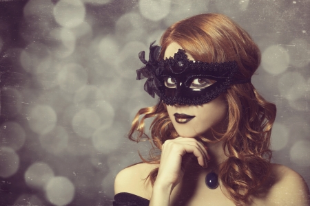 Beautiful women in carnival mask. In vintage style.の写真素材