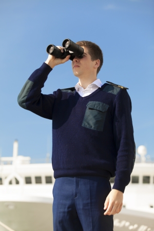 boatswain near the boatの写真素材