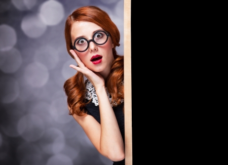 Surprised women with blackboardの写真素材