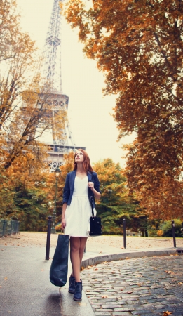 Parisian women at shopping time near Eiffel tower.の写真素材