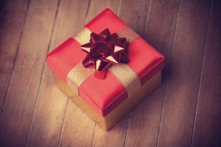 Christmas gift box on wooden tableの写真素材