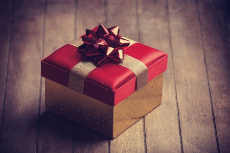 Christmas gift box on wooden tableの写真素材