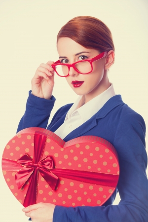 Women in glasses with giftの写真素材