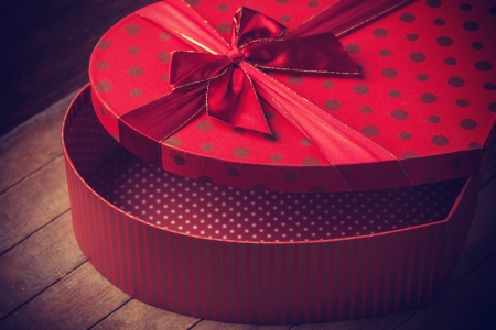 Heart shape valentine box handmade on wooden backgroundの写真素材