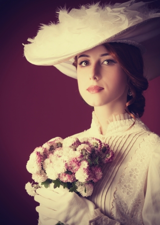 Beautiful redhead women with bouquet Beautiful redhead women with bouquet