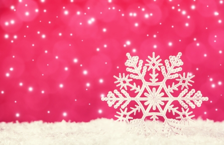 Snowflake on red background. Christmas timeの写真素材