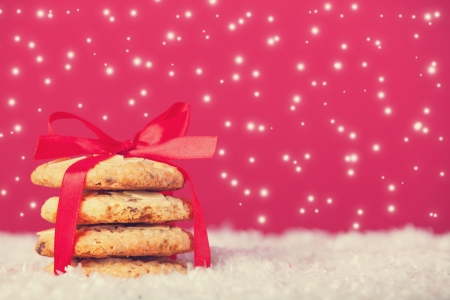 Christmas cookies and snow at backgroundの写真素材
