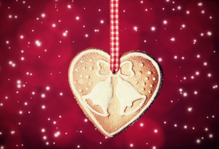 Cookie on red background. Photo in retro style.の写真素材