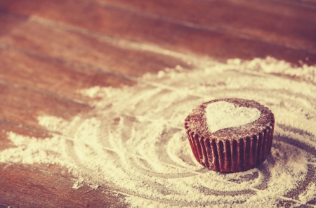 Cake with heart. Photo in old color image style.の写真素材