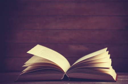 Open book. Photo in old color image style.の写真素材