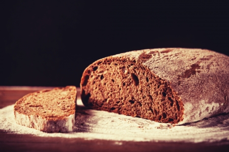 Delicious bread on a wood tableの写真素材