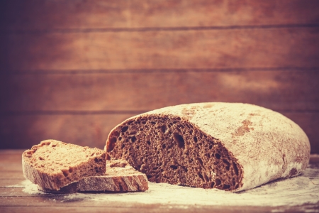 Delicious bread on a wood tableの写真素材