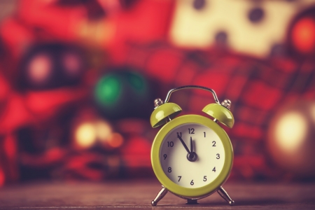 Vintage clock on christmas . Photo in retro color image style.の写真素材