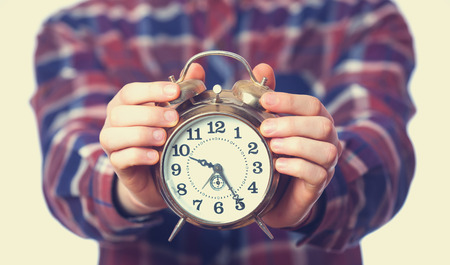 guy with alarm clock. Isolated.