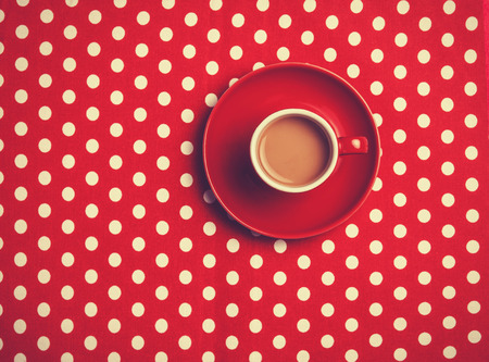 cup of coffee on speckled background.の写真素材