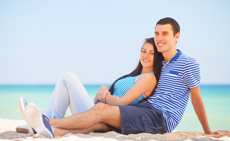 Beautiful couple on the beach.の写真素材