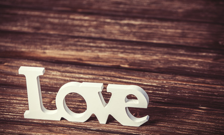 Word love on wooden table.の写真素材