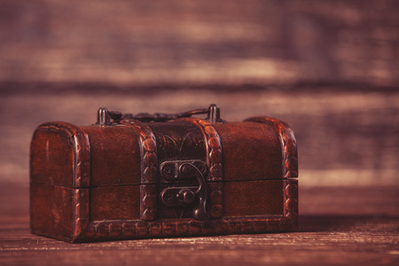 Casket on wooden table.